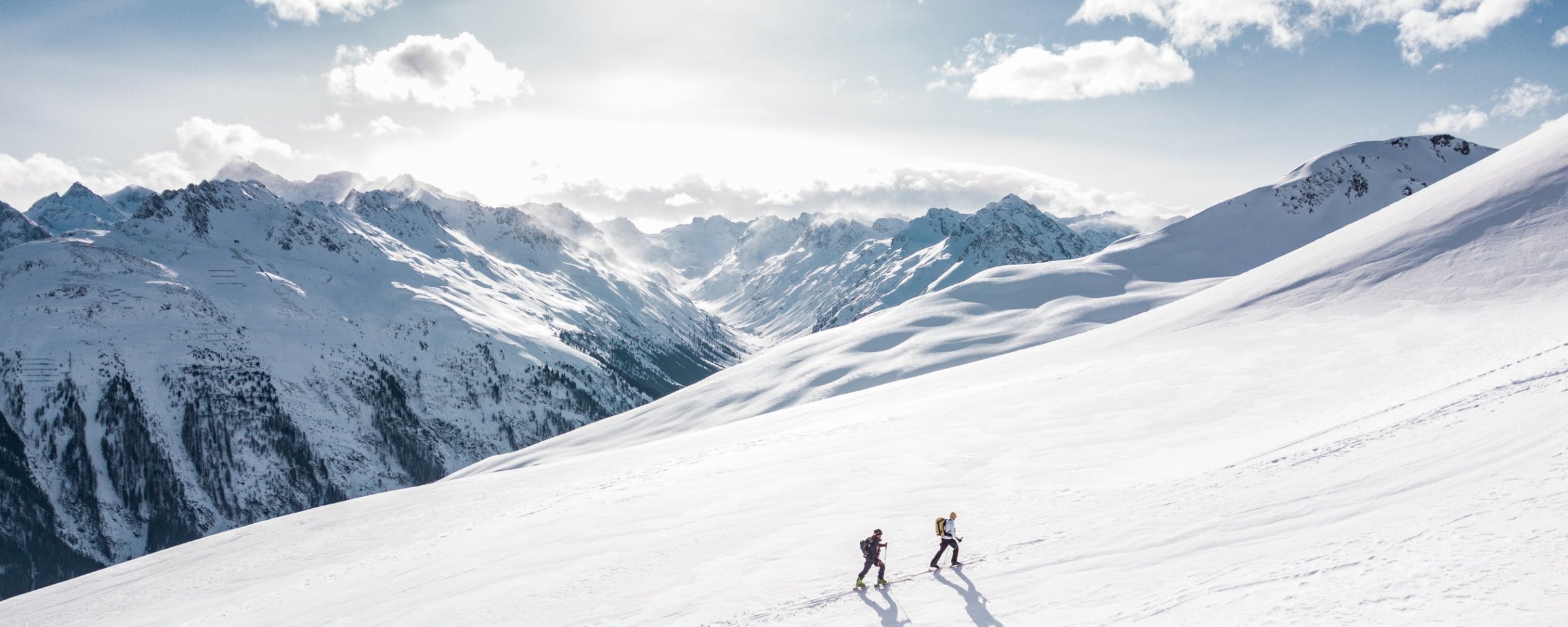 Two skiers ski-touring